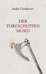 Cover des Romans "Der Torfschuppenmord", das eine mit einem Knotenmuster verzierte Axt und Blutspritzer zeigt.